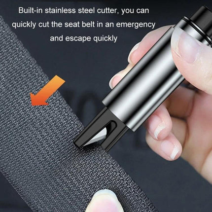 Compact Car Emergency Glass Hammer with Seat Belt Cutter shown cutting a seatbelt with built-in stainless steel cutter, compact alloy safety tool for vehicles