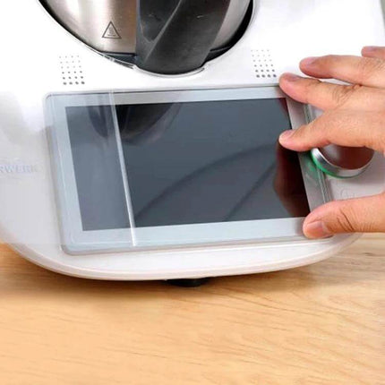 Tempered Glass Screen Protector For Thermomix Machines shown being applied to Thermomix TM6 touchscreen to protect against scratches, oil splashes and maintain touch accuracy