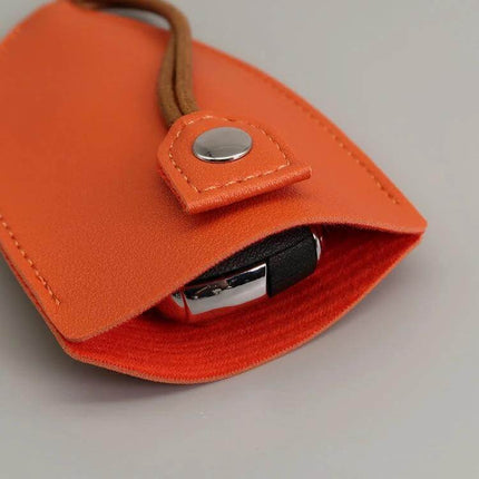 Pullout Personalized Ladies Car Key Bag Black For Home And Car Keys - compact PU key organizer in orange showing car key partially inside, lightweight travel-friendly