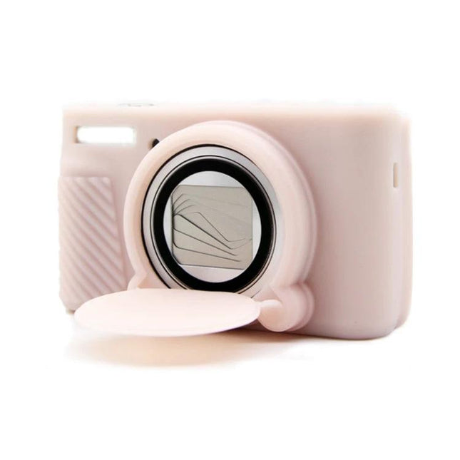 Soft Silicone Protective Case for Canon Cameras in pale pink fitted on compact Canon camera, shows lens cover open and button access