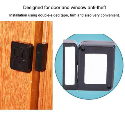 Wireless Magnetic Door and Window Alarm for Home Security showing black alarm and magnetic sensor mounted on wooden door frame