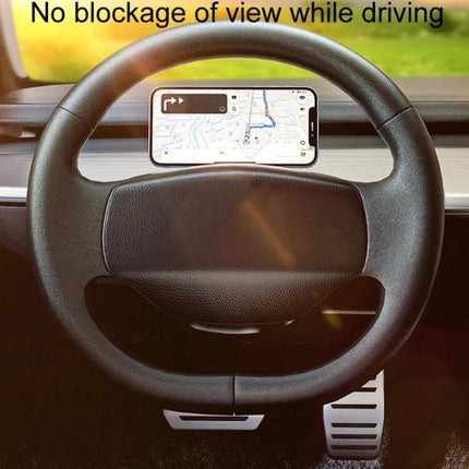 Magnetic Folding Car Phone Holder Rotatable Steering Wheel Mount attached to steering wheel displaying navigation without blocking view