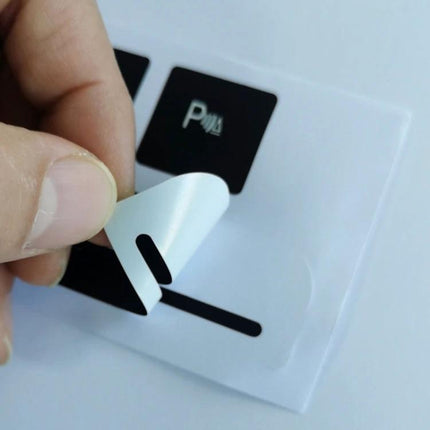Audi A4 Left-Hand Drive Emergency Button Repair Sticker showing white sticker being peeled for dashboard button restoration