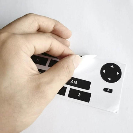 Repair Stickers for Fiat Grand Punto Multimedia Radio Buttons, 2 Pack - hand peeling black button stickers for dashboard radio controls