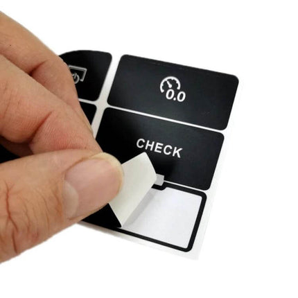 Repair Sticker for Audi A6 and A6L Central Control Buttons - PVC replacement labels showing 'CHECK' button being applied