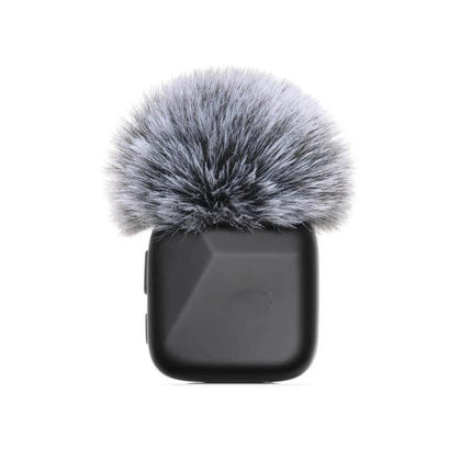 DJI Mic Mini Transmitter for Everyday Audio Recording compact black transmitter with grey furry windscreen, ultra-light 10g for vlogs and interviews