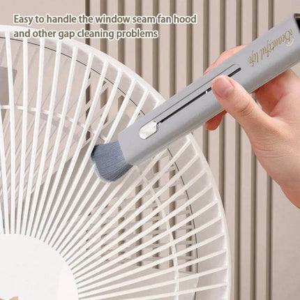 Retractable Soft Brush for Car Air Conditioner Vent Cleaning — retractable microfiber brush cleaning fan vents and tight gaps without scratching