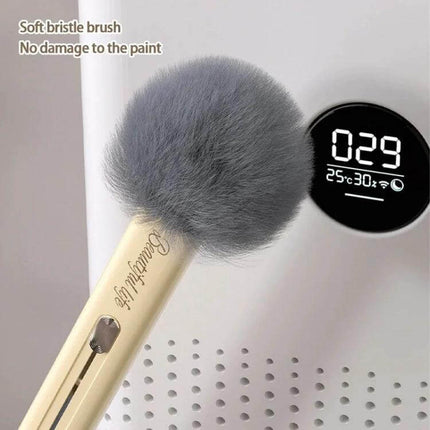 Retractable Soft Brush for Car Air Conditioner Vent Cleaning - microfiber retractable soft brush with gray round head and gold handle for dusting vents and dashboards