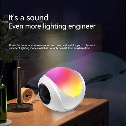 Portable Bluetooth Speaker Compact For Home And Travel Use with colorful ambient light on nightstand