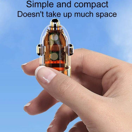 Vehicle Mini Invisible Dual-Port Car USB Charger Compact shown held between fingers, transparent casing reveals internal zinc alloy components