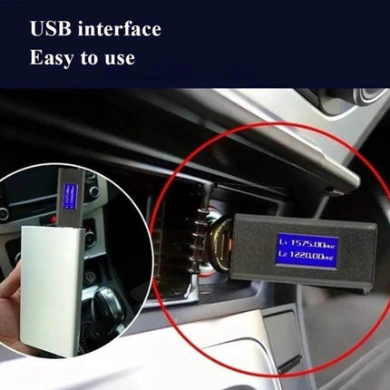 Universal USB GPS Signal Blocker for Privacy Protection in Vehicles inserted into car USB port with LCD display showing blocked frequencies