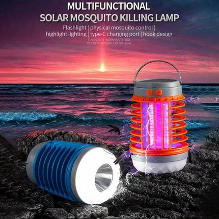 E SMARTER Outdoor Solar Mosquito Light Trap For Yard And Patio showing violet UV attractor and white ambient light with 360-degree grid on rocky beach