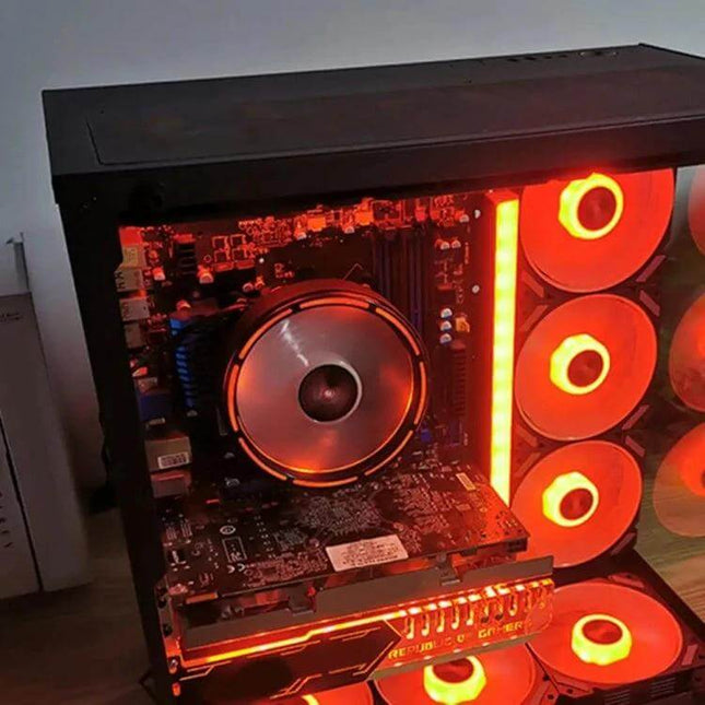 COOLMOON Color-Changing CPU Cooler for Quiet Desktop Computing installed in a red-RGB desktop showing low-noise operation and heat dissipation
