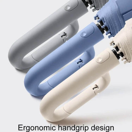 Automatic Foldable Umbrella for Rain and Sun Protection with ergonomic U-shaped handgrip in gray, blue and beige, automatic open/close, compact tri-fold design