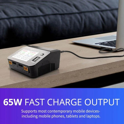 ToolkitRC Dual-Way Li-Po Battery Charger for Drone Models on table charging laptop, dual-channel 65W fast charge output