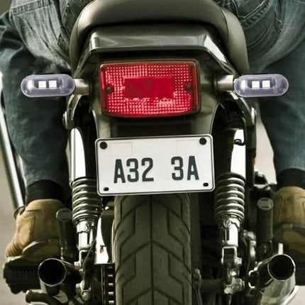 Wireless Remote Control Motorcycle Warning Light Magnetic Mount mounted on motorcycle rear showing magnetic compact light for improved visibility