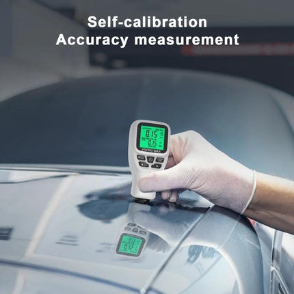 Coating Thickness Gauge for Measuring Industrial Paint Coatings measuring paint thickness on car hood with digital display and gloved inspector