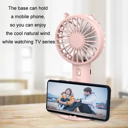 Portable Rechargeable Mini Handheld Fan with Phone Holder for Desktop Use — pink compact rechargeable desk fan holding smartphone for hands-free cooling
