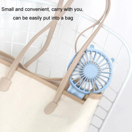 Portable Rechargeable Mini Handheld Fan with Phone Holder for Desktop Use shown compact in a bag for portable hands-free cooling