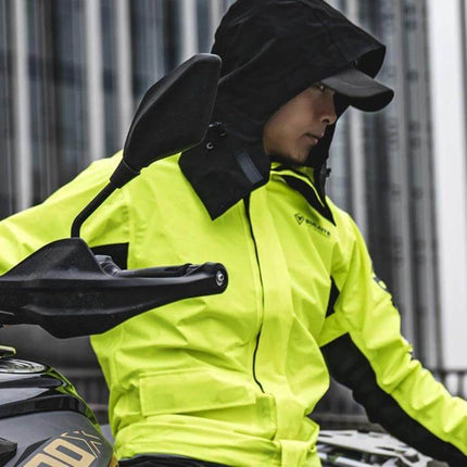 SULAITE Full-Body Motorcycle Raincoat, Breathable Waterproof, M-XXXL in neon yellow worn by rider on motorcycle, hood up, compact foldable design