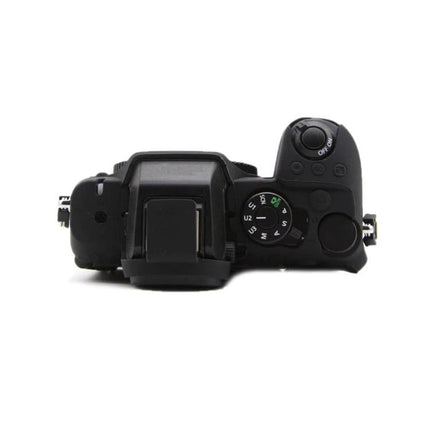 Soft Silicone Protective Case for Compact Digital Cameras with Smooth Surface — black silicone cover fitted on Nikon Z50II top showing controls