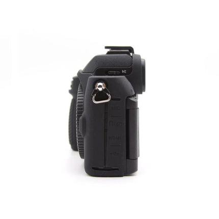 Soft Silicone Protective Case for Compact Digital Cameras with Smooth Surface fitted on a compact camera side view showing ports and strap loop
