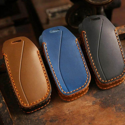 Hallmo Cowhide Car Key Cover For BMW Durable Everyday Use - three stitched cowhide key fob covers in brown blue and black fitted for 2024 BMW X73 key