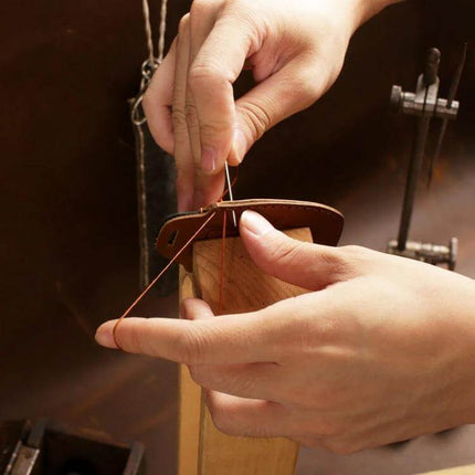 Key Cover For Motorcycle Brown Hollowed Daily Use - brown cowhide key cover being hand-stitched, precise mold for Yamaha keys, low-profile protection