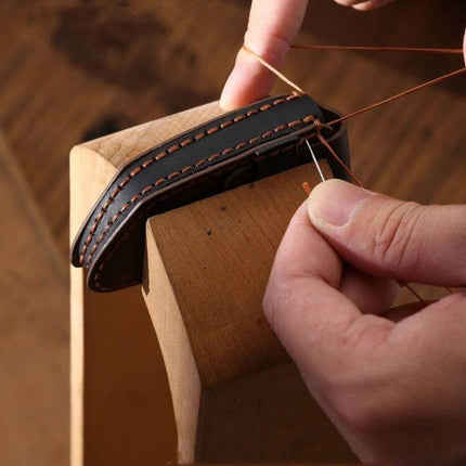 Handmade Hyundai Key Case For Hallmo Car Keys, 5 Or 7 Keys, Brown - artisan stitching on brown cowhide key case being hand-sewn