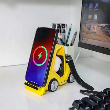 Forklift-Shaped Charger for Daily Desk Device Setup showing phone, earbuds, and smartwatch charging on a tidy yellow desk stand