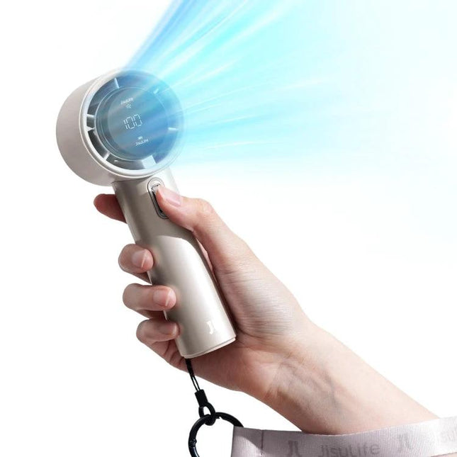 JisuLife Portable Rechargeable Handheld Cooling Fan for Everyday Use held in hand blowing cool air with LED display and wrist strap