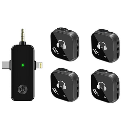 In-Ear Monitoring System for Musicians On Stage wireless transmitter and four in-ear receivers for live performance monitoring