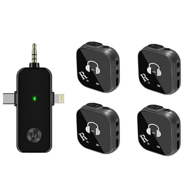 In-Ear Monitoring System for Musicians On Stage wireless transmitter and four in-ear receivers for live performance monitoring