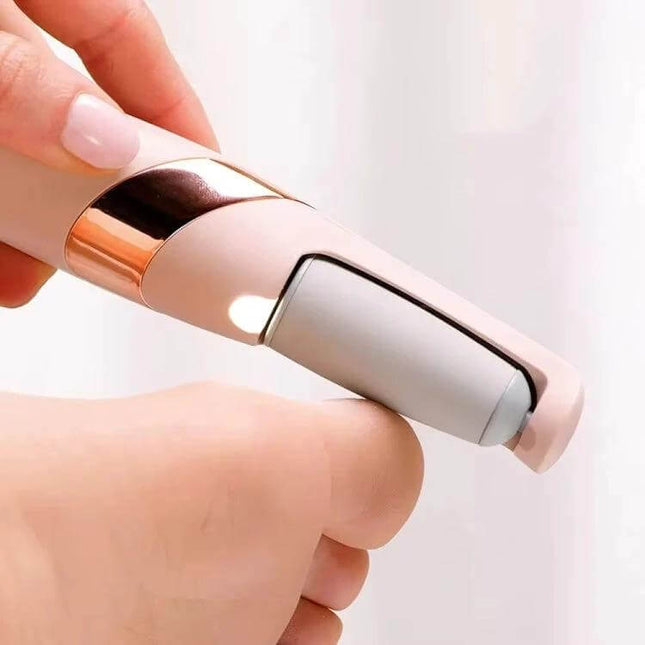 Electric Foot Grinder Rechargeable For Daily Home Use - close-up of rechargeable two-speed foot grinder smoothing heel with interchangeable head