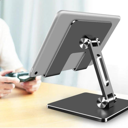 Desktop Adjustable Folding Stand for Tablets and Phones on desk holding tablet at adjustable angle to reduce neck strain