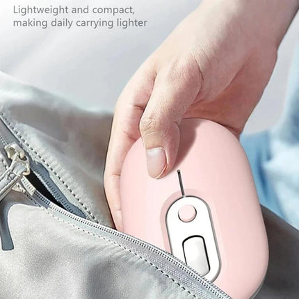 Rechargeable Silent Wireless Mouse with RGB Illumination – compact pink rechargeable silent wireless mouse being placed into a bag, lightweight 12.8x5.9x3.3cm