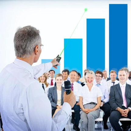 Doosl Long Distance Laser Page Turner for Presentations used by presenter pointing at chart and advancing slides in a large conference