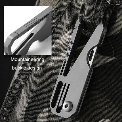 Titanium Keychain Folding Knife With Titanium Ring For Everyday Carry compact titanium keychain knife clipped to fabric, corrosion-resistant alloy