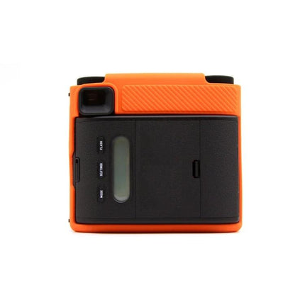 FUJIFILM Instax Mini 99 Silicone Protective Camera Case in orange silicone shown from rear with access to controls and viewfinder, protective stretchable cover