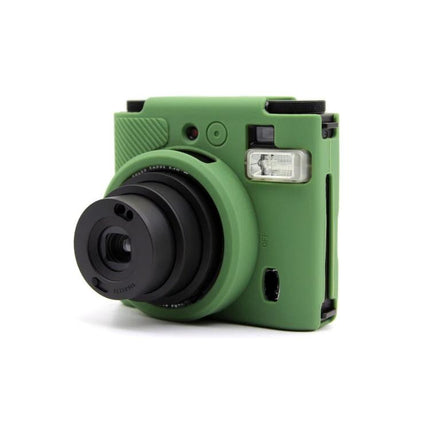 FUJIFILM Instax Mini 99 Silicone Protective Camera Case in green fitted on instant camera showing lens and flash