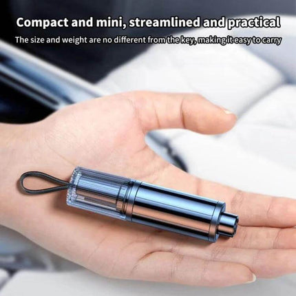 Portable Car Safety Hammer for Emergency Window Breaking and Seat Belt Cutting compact tungsten emergency tool shown in hand for easy carrying