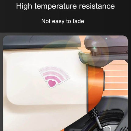 Reflective Car Safety Stickers for Night Visibility, 3-Piece Set on scooter showing pink reflective WiFi-heart decal enhancing nighttime visibility