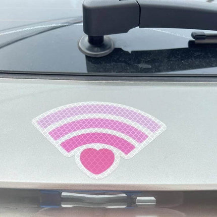 Reflective Car Safety Stickers for Night Visibility, 3-Piece Set - pink WiFi-style reflective warning sticker applied to car rear surface