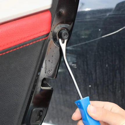 Essential Tool for Car Door Panel Removal in Home Repairs - blue-handled trim pry tool removing door panel fastener