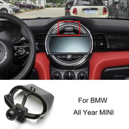BMW Car Air Outlet Phone Holder Snap On Dashboard Mount shown clipped to MINI dashboard air vent above center display