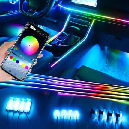 Car Hidden Acrylic RGB LED Ambient Light Strip For Interior Mood installed along dashboard and footwells with app-controlled RGB color wheel