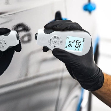 Precise Gauge for Measuring Coating Thickness on Surfaces used by technician to check paint thickness on a car panel