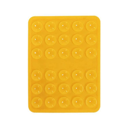 Silicone Double-Sided Suction Cup Holder for Mobile Phones in yellow, soft durable silicone pad with multiple suction cups for dashboard, desk, mirror use