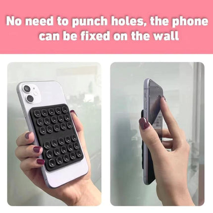 Silicone Double-Sided Suction Cup Holder for Mobile Phones attached to phone and fixed on glass wall for hands-free use