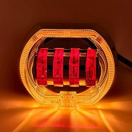 Motorcycle LED Headlight With Double Lens, 4 Color Options shown lit with amber halo and red inner LEDs on aluminum housing, IP68 weatherproof